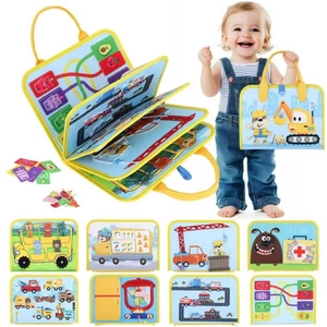 Detail view of the felt busy board showing colorful vehicle and cooking interactive pages