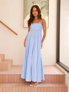 Women's blue and white striped A-line sundress with open back and flowing hemline