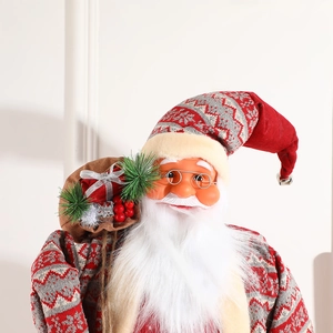 Standing Santa Claus figurine decoration with red knit suit and brown burlap gift bag