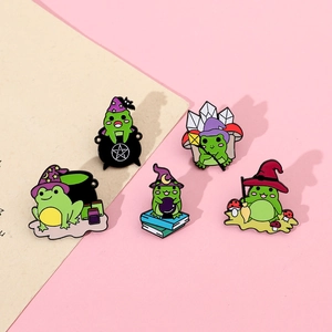 Detailed set of five cartoon magic frog enamel pins with wizard hats and crystal balls