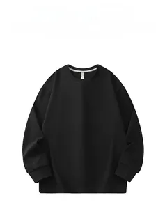 Detailed view of black crewneck sweatshirt collar showing fine jacquard knit texture