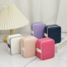 Portable PU leather jewelry boxes in multiple colors featuring metal snap closure design
