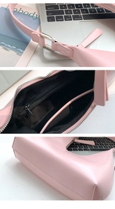 Detail view showing pink PU leather shoulder bag hardware and interior pocket structure