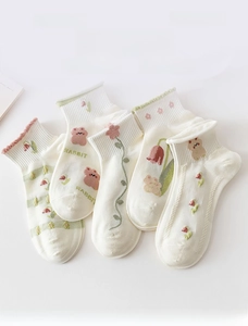 Set of five white cotton socks with cute floral embroidery and ruffled edge trim