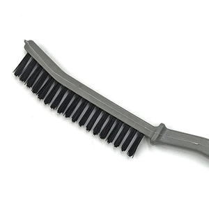 Window groove cleaning brush with gray plastic handle and sturdy black bristles