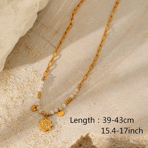 Detail of layered gold-plated stainless steel necklace with length measurement 39-43cm