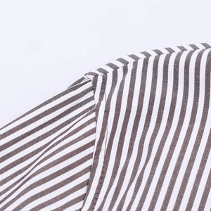 Close-up of the shoulder seam and striped fabric texture on this casual long sleeve shirt