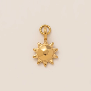 Miniature 18K gold plated stainless steel sun pendant with a polished metallic finish