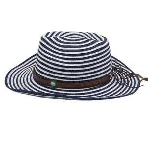 Close-up of striped straw hat with leather band, metallic rivets and turquoise stone detail