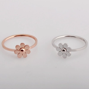 Minimalist sunflower petal titanium steel rings in rose gold and silver finishes