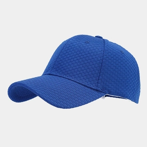 Detailed view of royal blue waffle weave texture on breathable cotton baseball cap