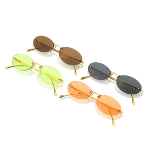 Y2K rimless metal oval sunglasses in brown, green, black and orange for women