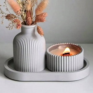 Detailed view of grey striped resin molds for tray, vase, and candle holder crafts