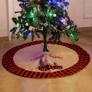 Classic red plaid Christmas tree skirt with vintage truck embroidery and Merry Christmas text