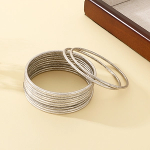 Stackable multi-layer 3mm silver stainless steel coil bracelets with minimalist matte finish