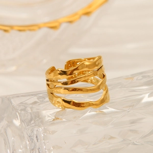 Gold stainless steel irregular wavy multi-layer open ring on glass texture base