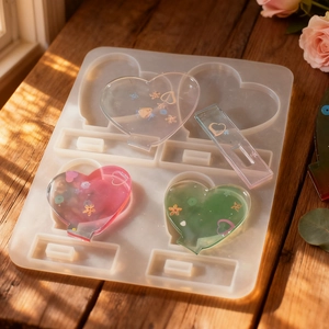 Silicone 4-heart photo frame resin mold with finished glitter heart craft pieces
