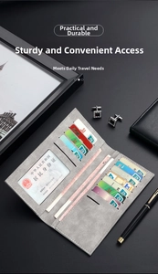 Detail showing internal multiple card slots and clear ID window of the grey matte wallet