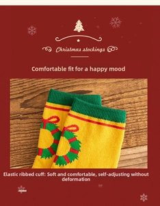 Detail of Christmas stocking cuff with festive wreath pattern and elastic knit texture