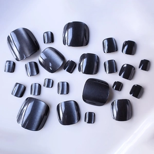 Short square black cat eye press-on toenails with glossy magnetic finish and shimmer