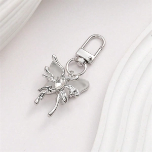 Elegant silver butterfly keychain with clear crystal stone and metallic lobster clasp