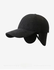 Detail of wool blend baseball cap showing thick texture and ear protection flaps
