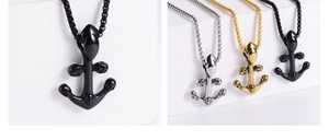Detail of punk style anchor pendant necklaces with skull emboss in black, gold, and silver