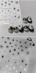 Makro-Detail von TS-3321 5D-geprägten Nagelstickern mit Sternen und geometrischen Mustern