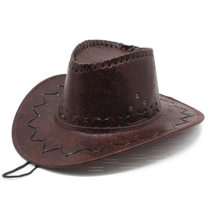 Close-up of vintage brown cowboy hat featuring X-stitch crown and black stitched brim edge