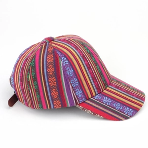 Detail of colorful bohemian striped baseball cap showing ethnic fabric texture and stitching