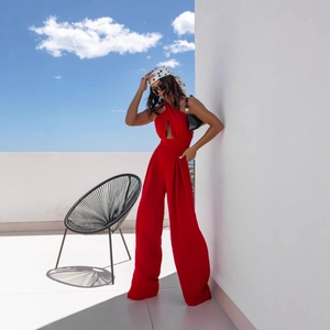 Elegant red halter neck sleeveless wide leg jumpsuit for summer fashion and resort wear