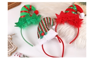 Detailed view of three festive Christmas elf hat headbands with plush bells and stripes