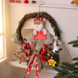 Detailed view of a Christmas wreath with Santa Claus doll and Merry Christmas ribbons