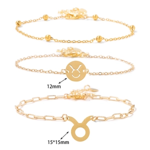 Three-piece golden Taurus constellation bracelet set with minimalist charm chains
