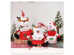 Detailed close-up of knit Christmas gift bags featuring reindeer, Santa and snowman designs