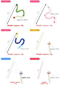 Detail view of colorful feather and plush cat wands showing various interactive styles
