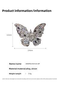 Macro detail of butterfly ear cuff with cubic zirconia stones showing size 2.4cm x 2.2cm