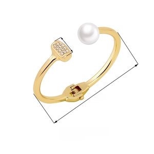 Minimalist gold open cuff bracelet featuring a round pearl and crystal rectangle accent