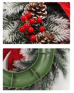 Detail showing red berries, pine cones, and snowy needles on a Christmas wreath