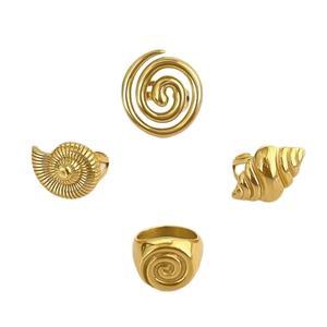 Vintage gold stainless steel spiral seashell rings set with hollow carved design