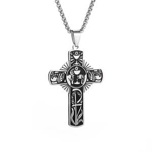 Detailed engraving of religious symbols on a stainless steel cross pendant necklace