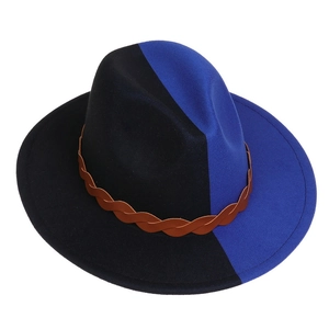 Detail of bicolor wool fedora featuring black and royal blue split with brown braided band