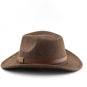 Detail of brown faux suede cowboy hat with wide brim and decorative leather band
