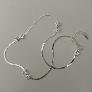 925 Sterling silver snake chain necklace with three bow charms and lobster clasp