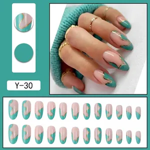 Mint green and nude long oval press-on nails with elegant gold wavy line designs