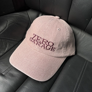 Detail shot of vintage corduroy baseball cap with purple Zero Garage letter embroidery