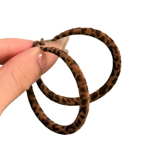 Vintage leopard print hoop earrings featuring a soft flocked texture for a stylish winter look