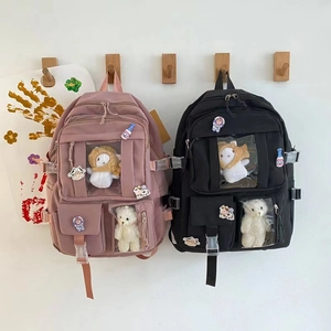 Pink and black large capacity student backpacks with clear display pockets and cute charms