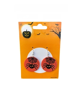 Detail of orange Halloween hoop earrings featuring black spider and web patterns