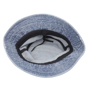 Detail of blue denim bucket hat interior with adjustable drawstring and sweatband